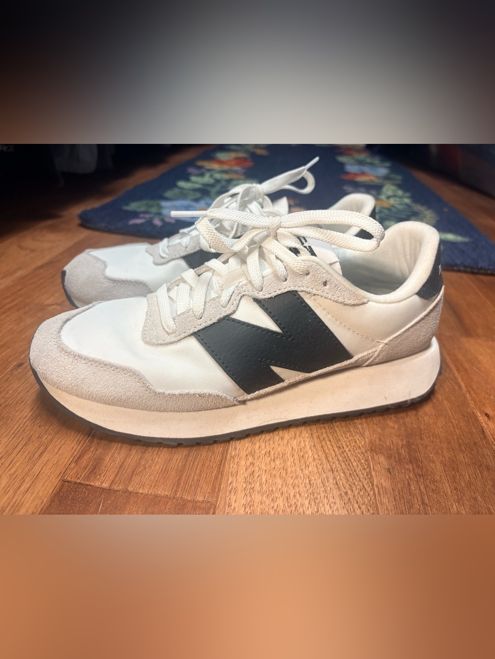 New Balance women’s size 9.5 Sneakers - White with Black 'N'